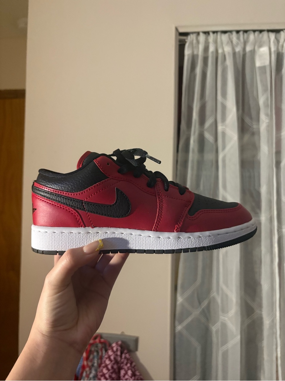 Jordan Low-Top Sneaker in Black and Red